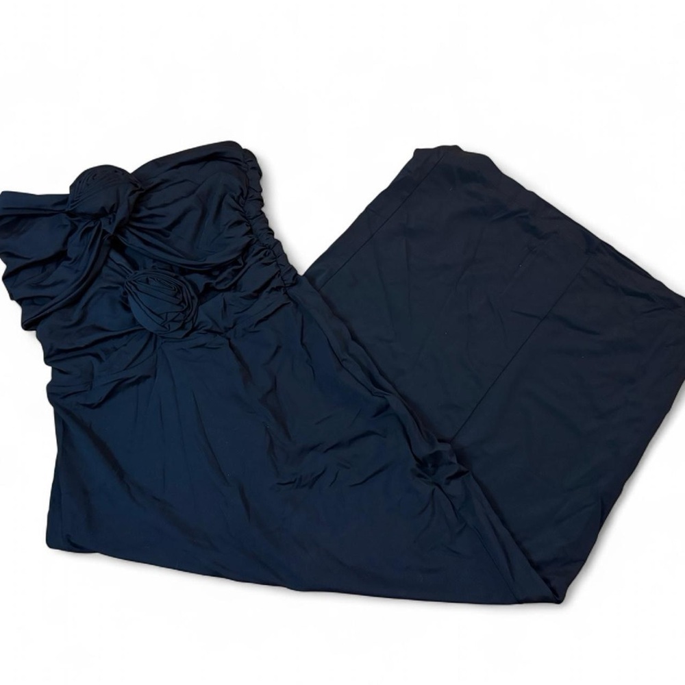 Black strapless maxi dress with ruffled flower detail. Size small.